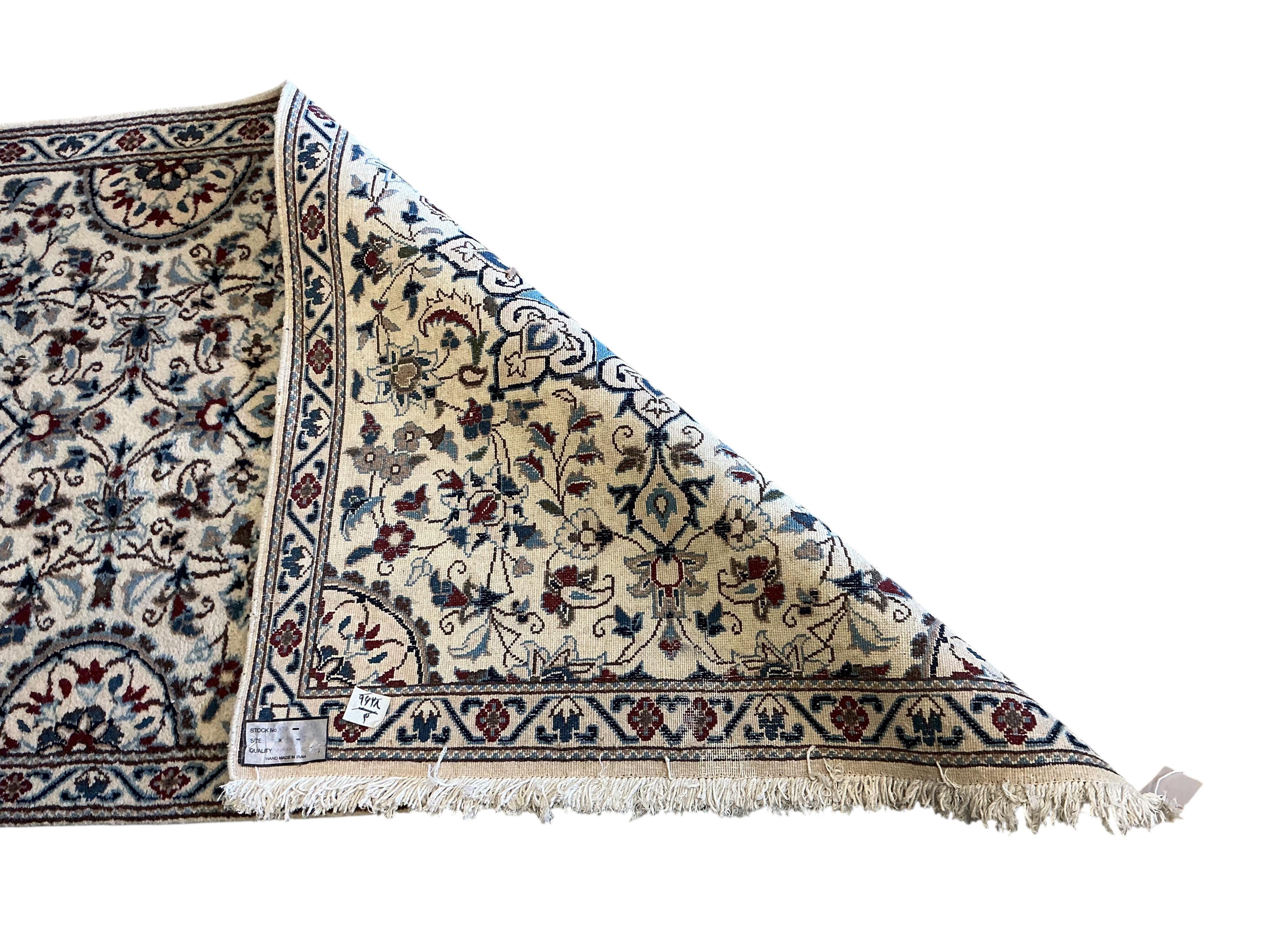 A Nain ivory ground runner, 386 x 86cm
